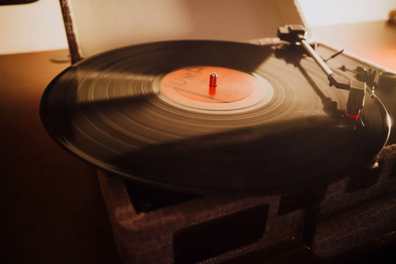 Clean vinyl record playing on a turntable in a well-maintained collection.